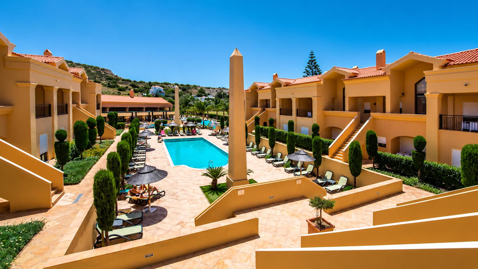 Baía da Luz Resort → Situado na encantadora vila da Luz, a poucos passos da praia, o Baía da Luz Resort oferece apartamentos modernos e totalmente equipados, inseridos num ambiente tranquilo e familiar. Serviços e comodidades:
Apartamentos espaçosos e totalmente equipados
Piscina exterior para adultos
Piscina exterior para crianças
Jardins e zonas de lazer
Campo de ténis
Parque infantil
Aluguer de bicicletas
Restaurante Alloro
Bar
Estacionamento
